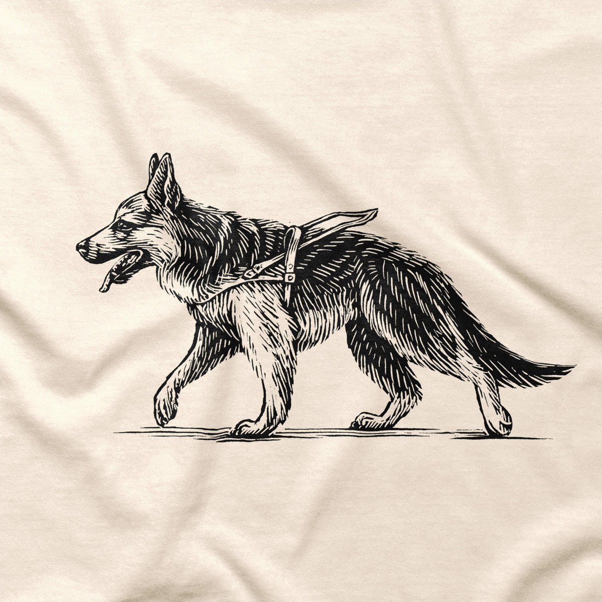Close-up of the T-shirt's black walking German Shepherd illustration