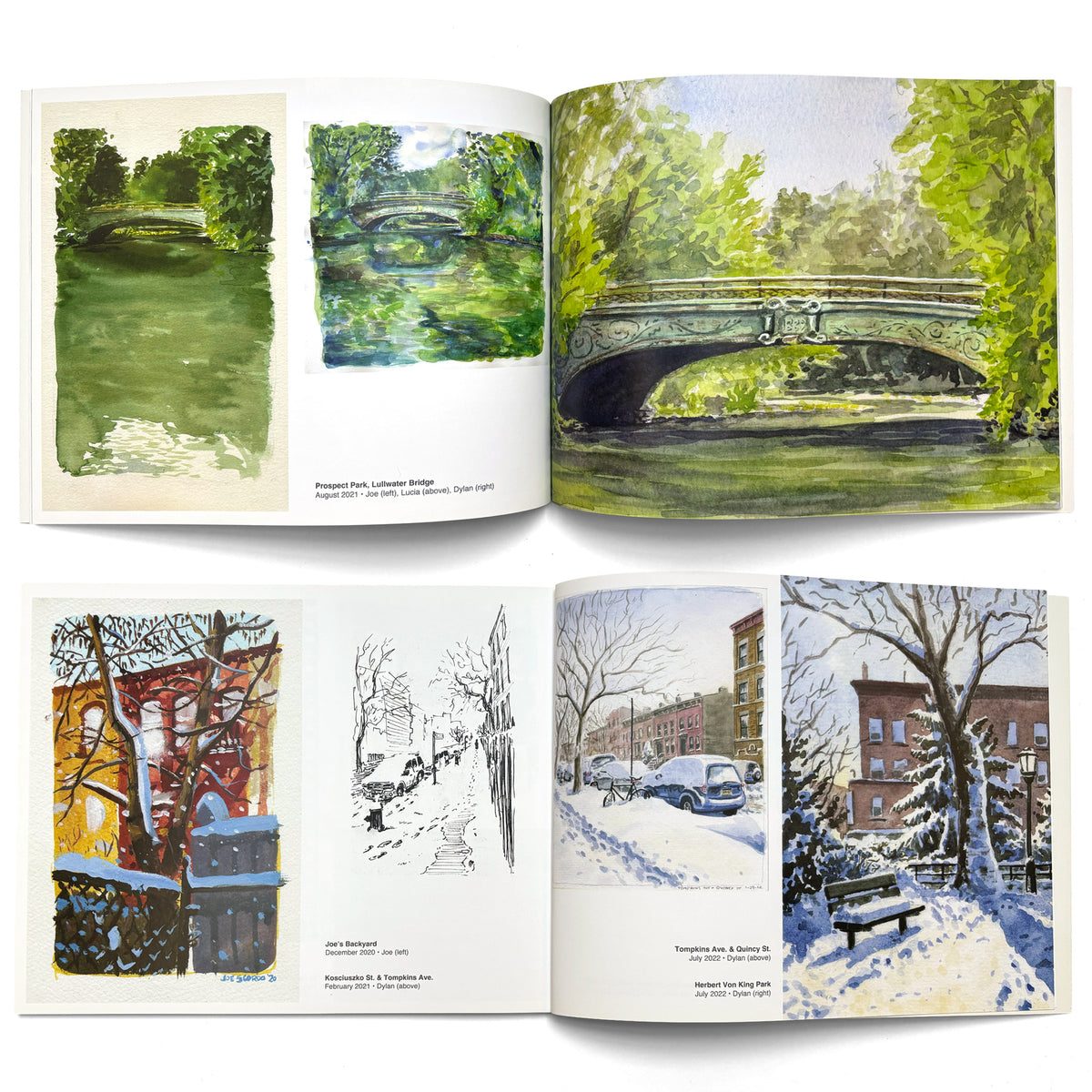 Open watercolor book showing painted parks, bridges, and snowy city scenes