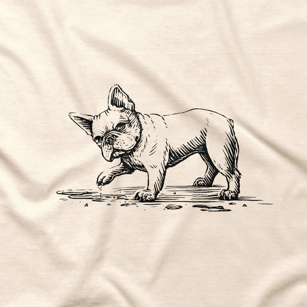 Natural T-shirt detail showing a black French bulldog illustration