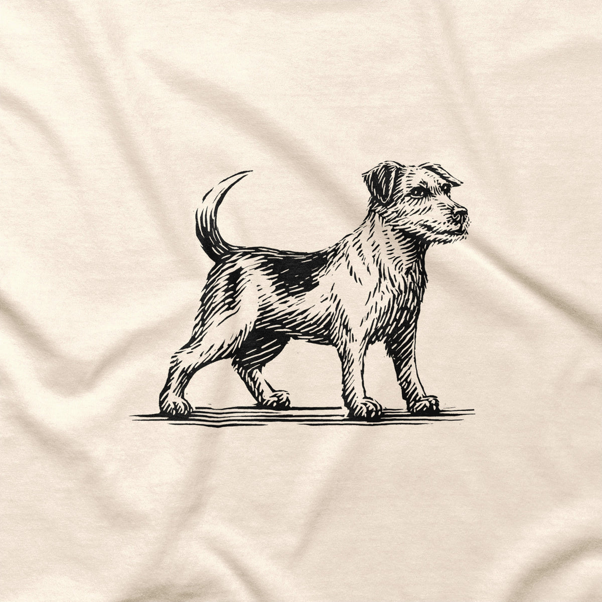 Close-up of the black Jack Russell Terrier illustration printed on a natural T-shirt