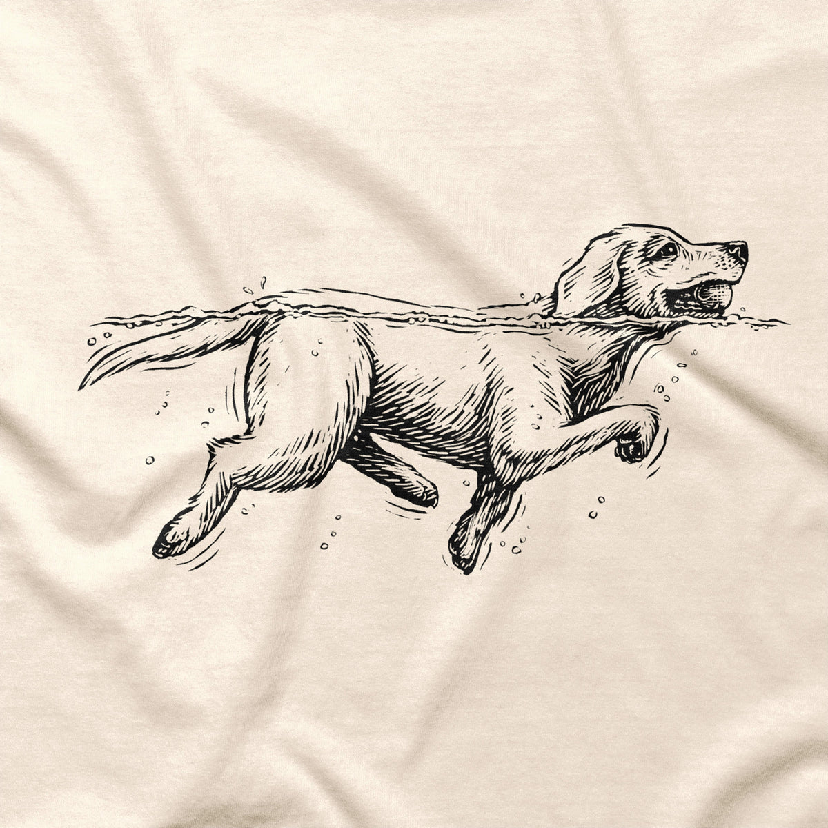Close-up of a Labrador Retriever T-shirt graphic showing a dog swimming
