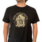 Black Shake Dog T-shirt worn, with a cream dog graphic and circular text on the chest.